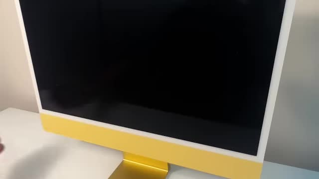 Unboxing yellow Apple imac