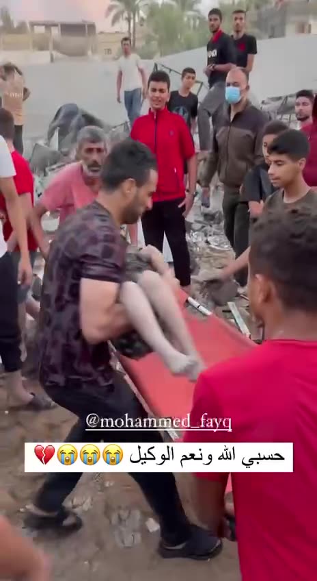 Palestinians pull trapped civilians from rubble caused by Israeli bombing in Gaza