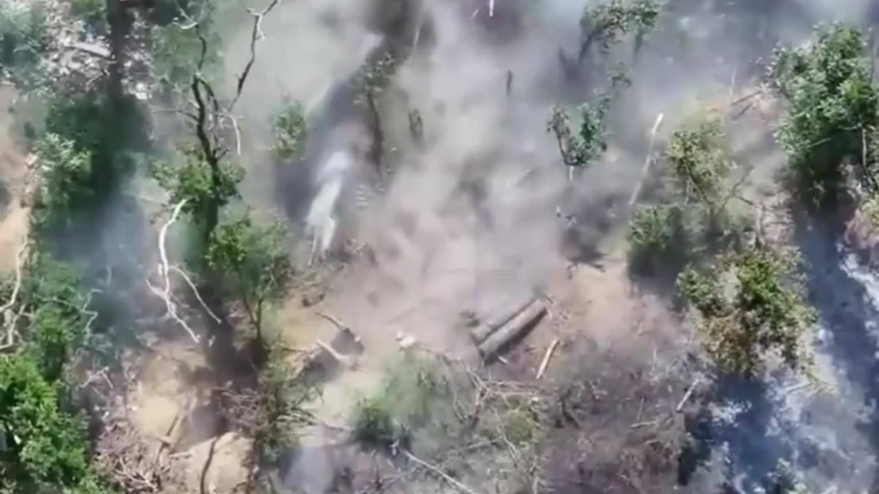 Ukrainian drone drops a large explosive right into a Russian soldiers lap