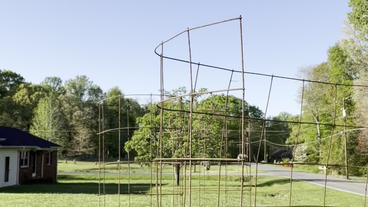 Reclaiming wire to use as tomato cages.