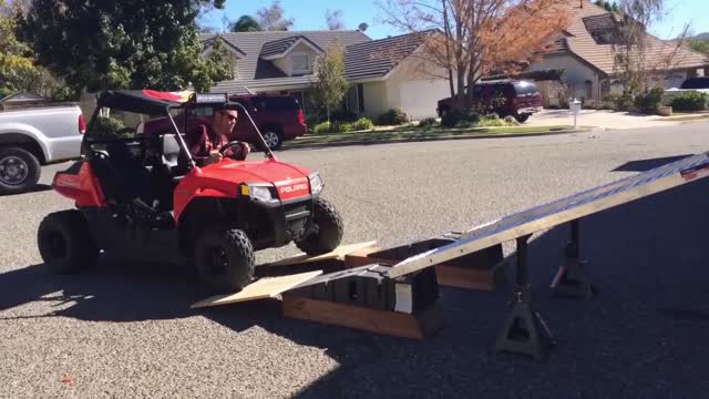 ATV Goes Off Road And Off Ramp