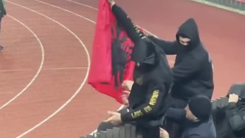 Serbian hooligans burned the Albanian flag last night in the match against Switzerland