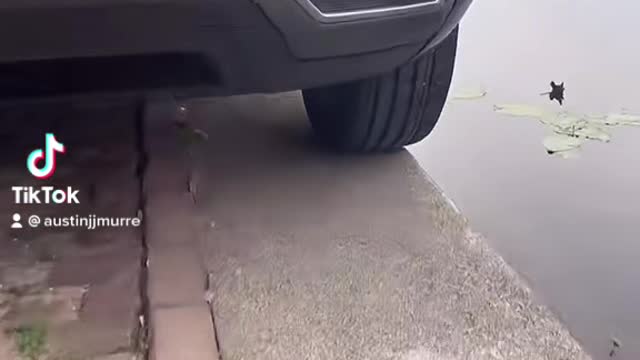 Tight Streets Force Cars to Park on the Edge