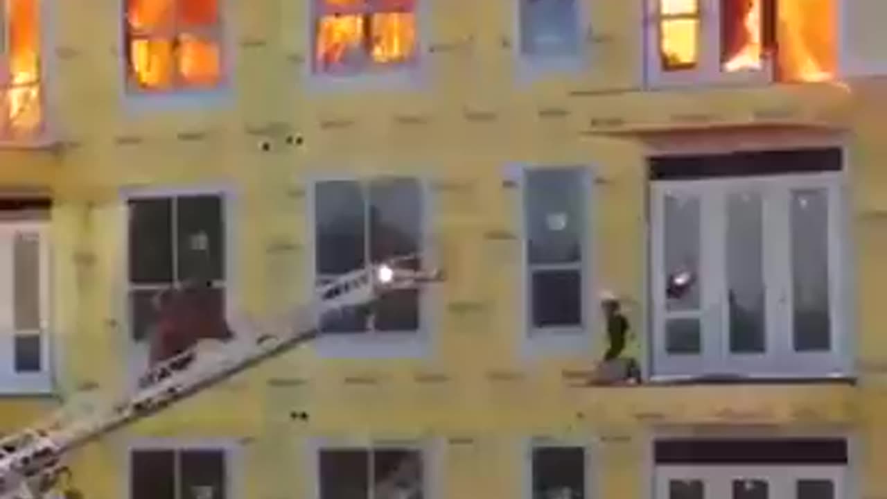 Construction worker rescued from burning building