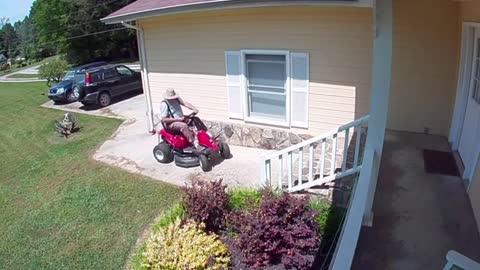 Guy Riding Lawnmower Accidentally Drives Over His Wife's Plants