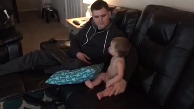 Baby dances with daddy