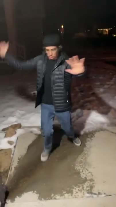 Guy slips on ice for 17 seconds