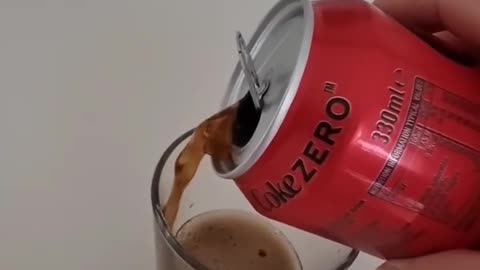 Fill the glass with Coke