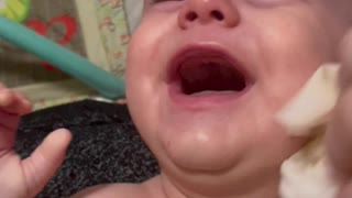 Baby Giggles While Getting His Face Cleaned