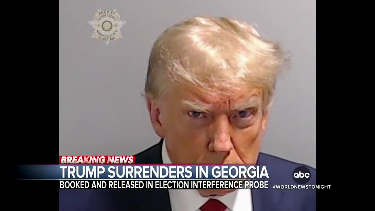 Trump Surrenders for booking in Georgia election inference case