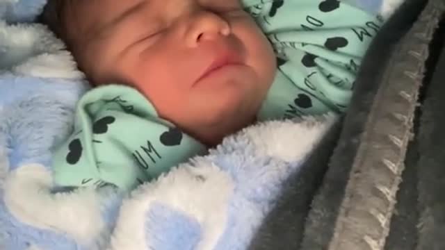 Only 12 hours old and talking to his sleep