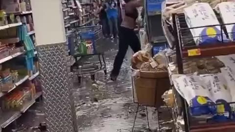 Black ass hoe smashes the shit out of Bottles at Walmart in USA