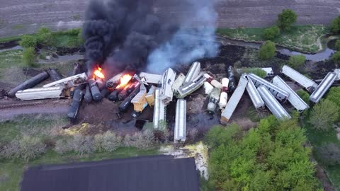 Drone Hovers Over Burning Train on Railroad After Accident