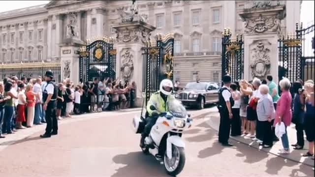 Queen Leaving Her Palace in Her “New Bentley ”