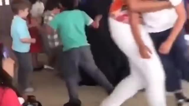 Kid jumps into a Fight to save his Favourite Super Hero. Too funny