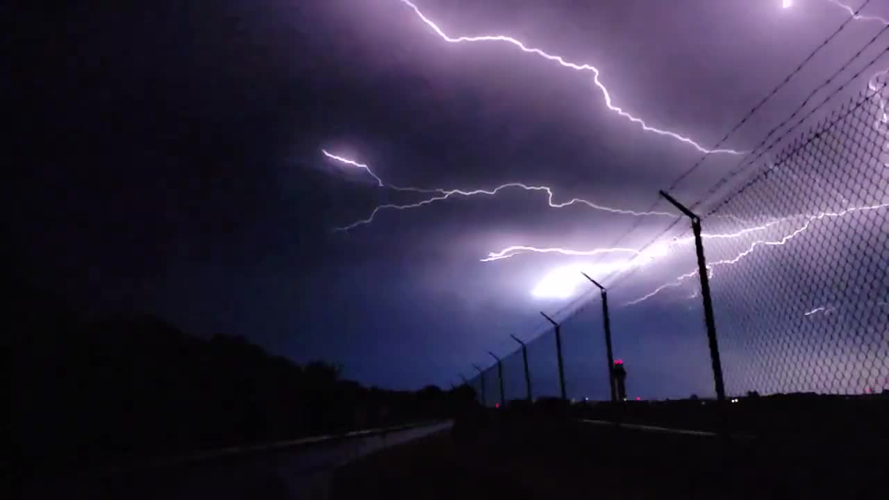 Lighting Bolt Lit up the Sky in Slow Motion Streaking From Right to Left Side