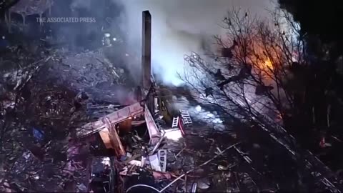 Explosion at a Virginia home kills 1 firefighter, injures 11 others