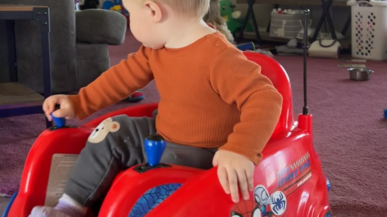 One-Year-Old Nods Off While Driving Toy Car