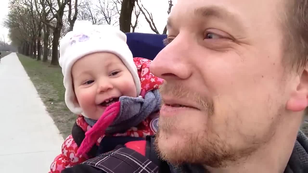 Baby laughing while her dad tries to make her say 'daddy'