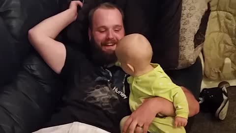 Cute babies spend time with their daddy