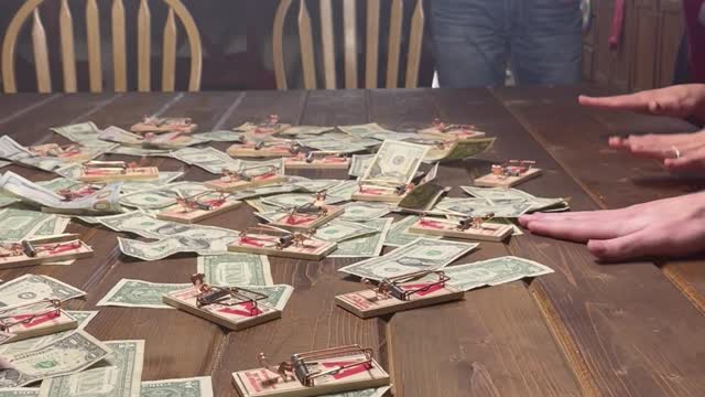 Family Plays Mouse Trap Cash Grab Game