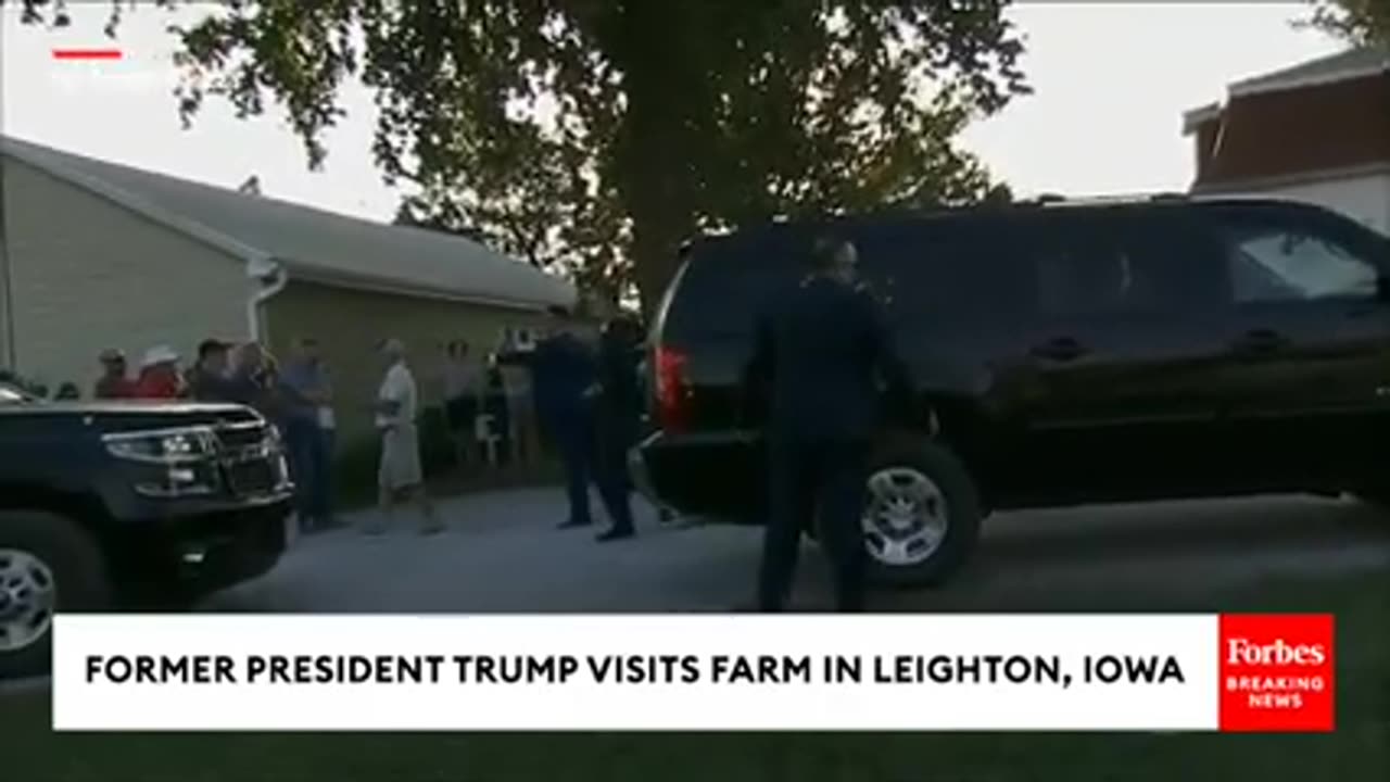 Trump Visits Farm In Leighton, Iowa, Signs John Deere Combine