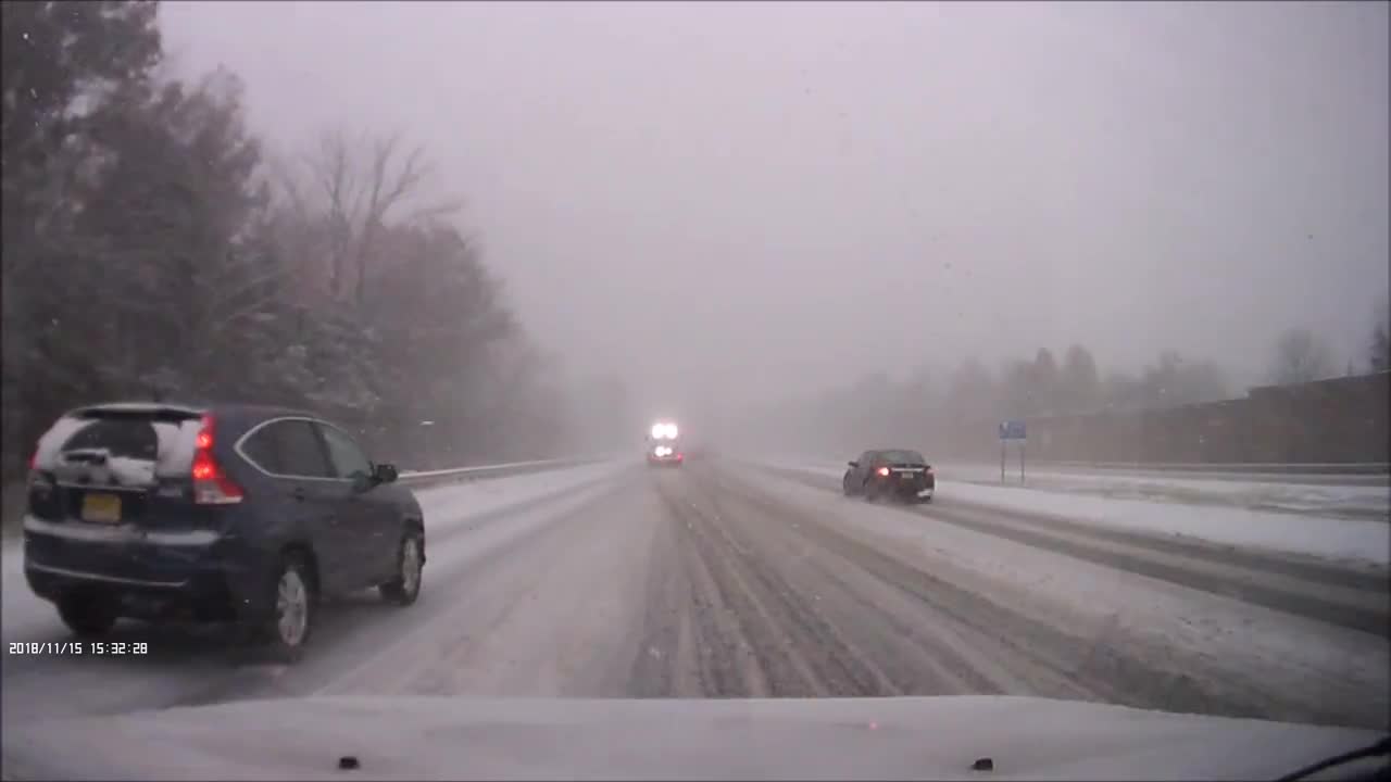 Dash cam Footage captures truck spinning out in the snow