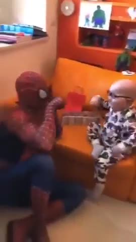 Spiderman visits a sick child who has Cancer for Christmas and he was happy