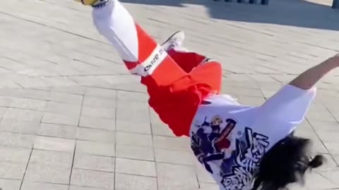 A little girl dancing hip-hop
