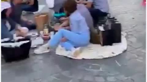 Paris citezens have picnics out on the street to protest vaccine mandates at restaurants