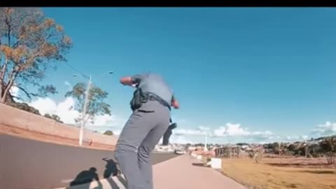 POLICE OFFICER TEACHING SKATEBOARD TRICKS