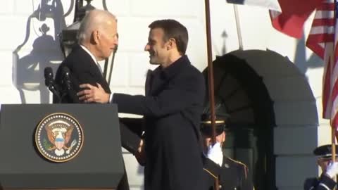 Biden Shakes Emmanuel Macron's Hand for Incredibly Awkward 42 Seconds