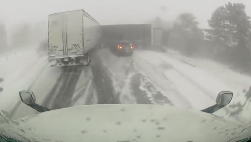 Dashcam footage of a truck ramming into car involved in pileup in Canada