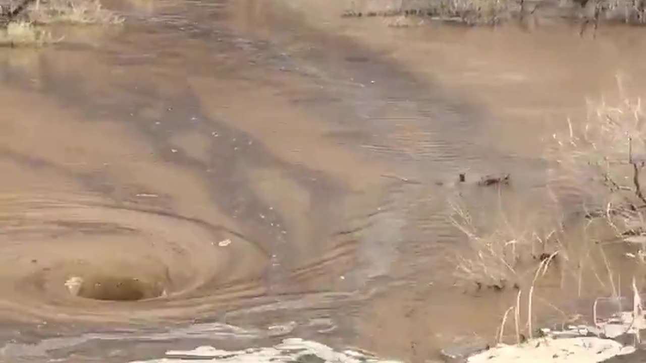 NEVADA MYSTERIES ~WHIRLPOOLS TO THE UNDERWORLD IN RED ROCK CANYON AFTER A HEAVY RAIN