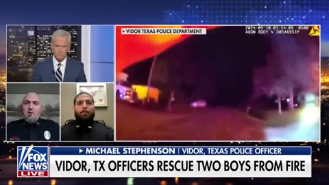 Bodycam footage shows police officers rescue two children from burning home