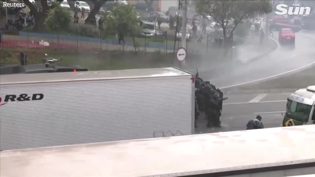 Brazilian police fire water cannons and rubber bullets at anti Lula protesters