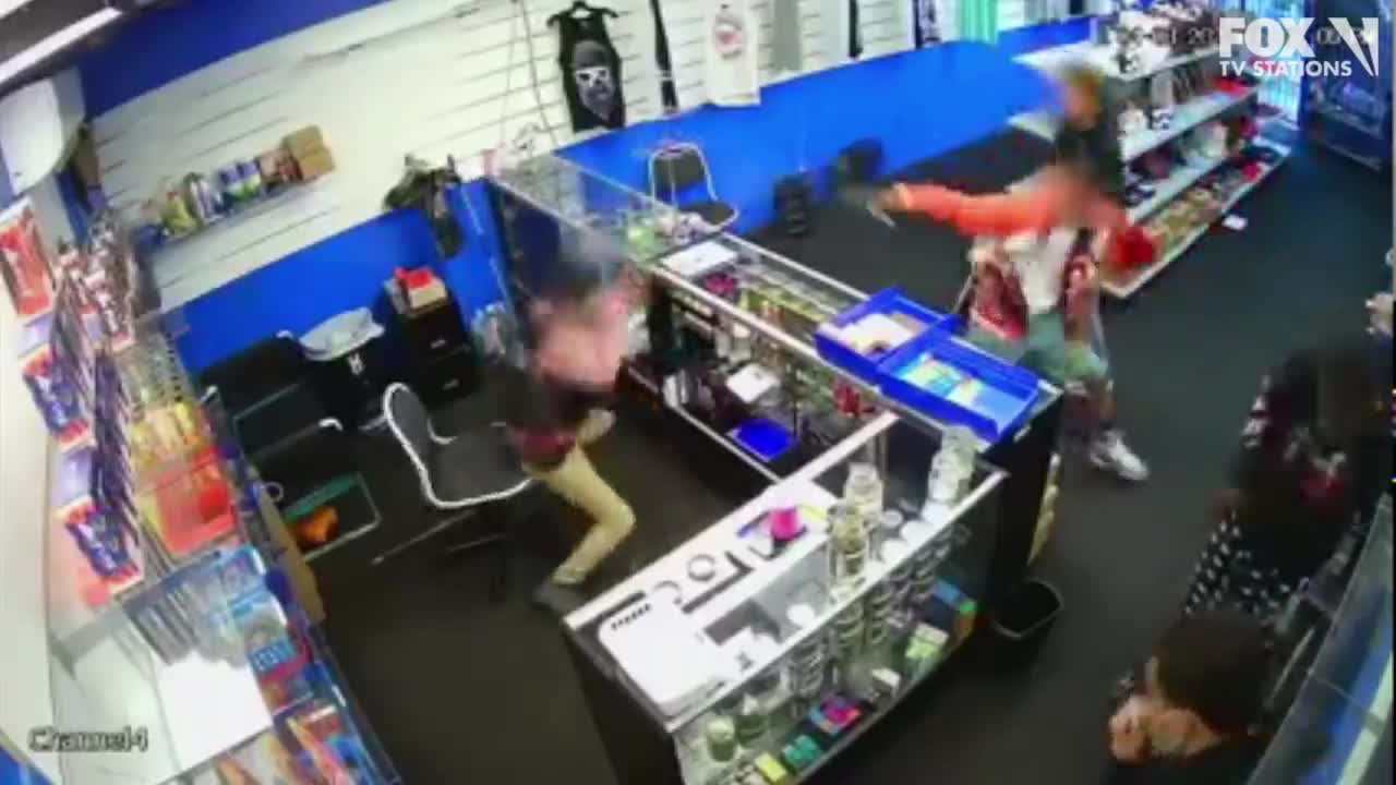 VIDEO: Gun battle breaks out between store employee and would-be robbers