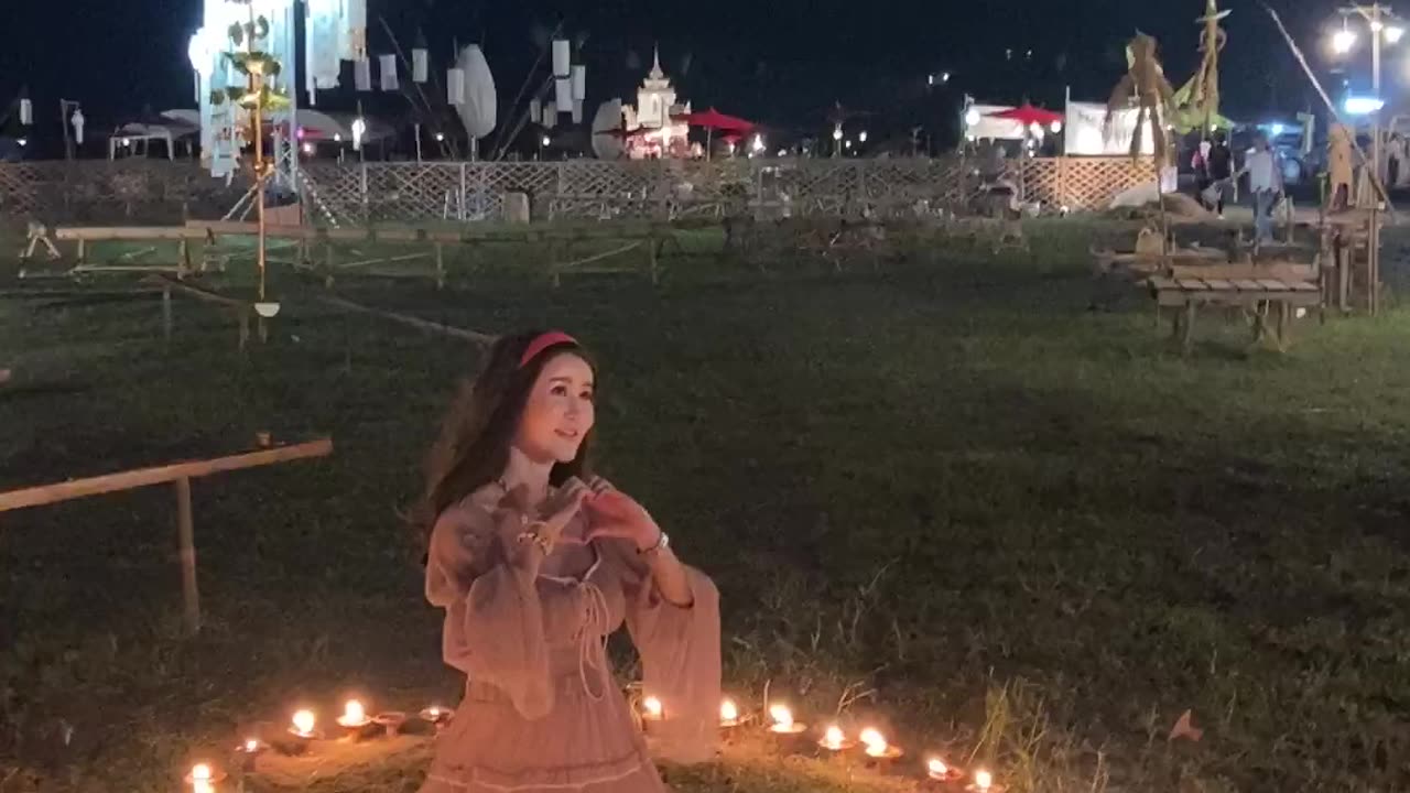 A women sitting on the grass