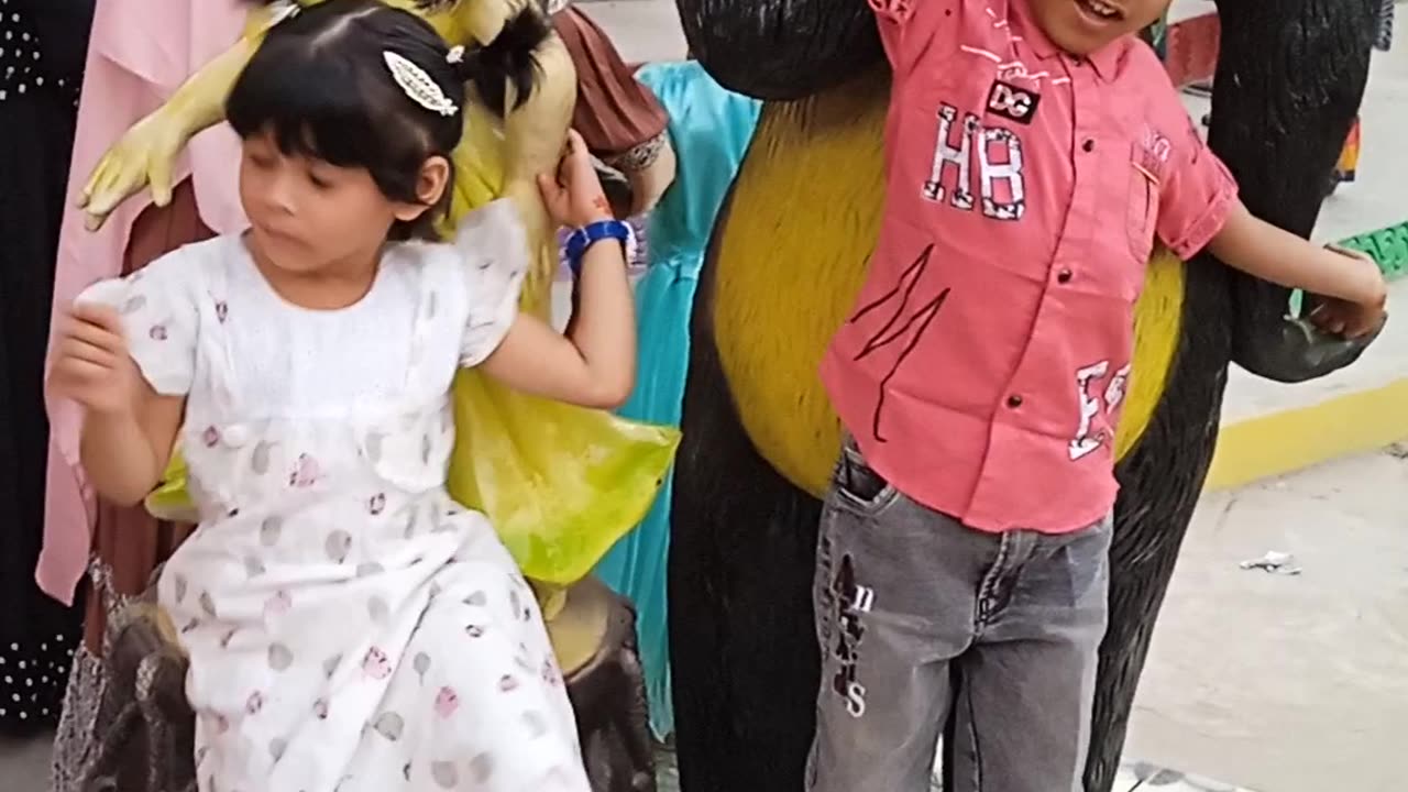 Little boy and girl playing.