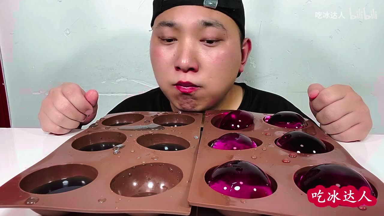 Eat frozen purple and blue crystal balls and listen to the crunching and drinking sounds!