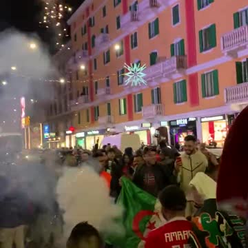 Fans in Milan celebrate Morocco's World Cup win over Spain