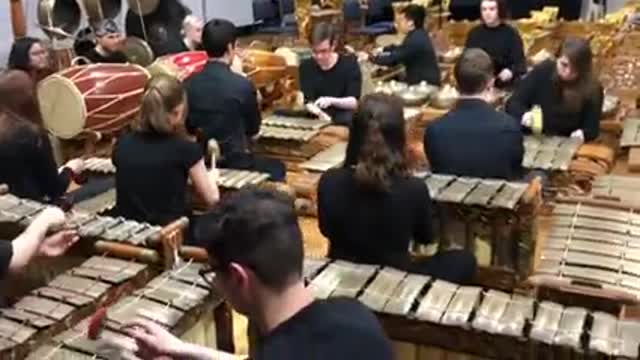 Victorian students demonstrate in action to play gamelan