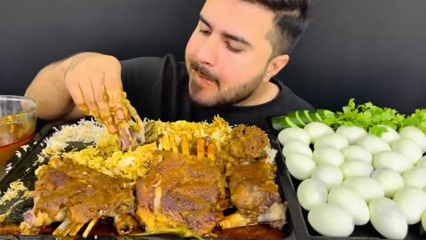 spicy mutton curry with rice extra gravy boiled eggs eating,