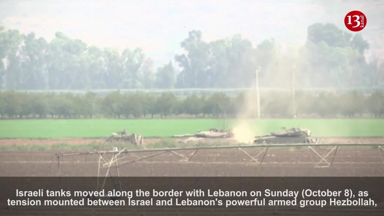 Israeli tanks seen moving on the border with Lebanon