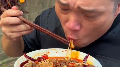 Cook And Eat Spicy Soup Filled with Tripe and Pork Bones