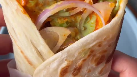 "Sizzling Spice and Dreamy Cream: Relish the Epicurean Delight of Paneer Frankie!"