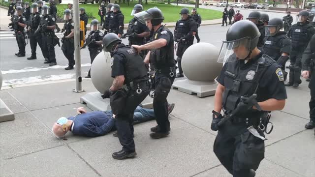 Slow motion video of Buffalo Police Shoving 75-year-old Martin Gugino to the ground