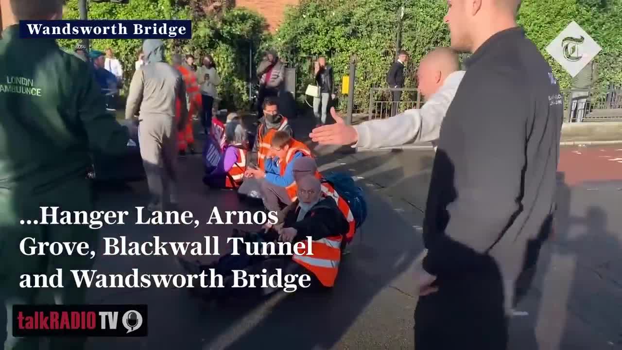 Insulate Britain activists pulled off the road by drivers, police and a paramedic