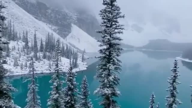 Snowfall at Moraine Lake in Canada Tag someone who would enjoy this! #shorts #canada