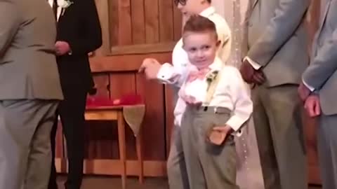 kid playing in the marriage ceremony